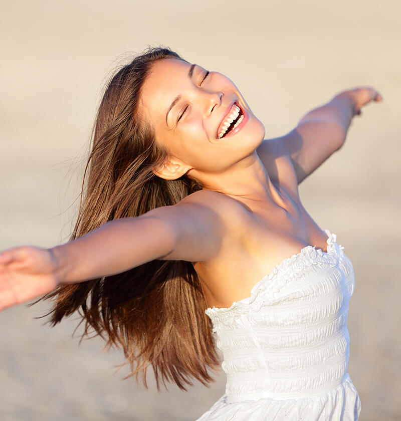 Woman with her arms stretched out