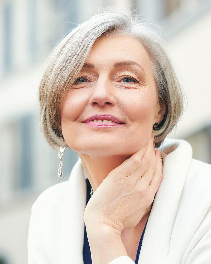 Mature woman with short cropped hair