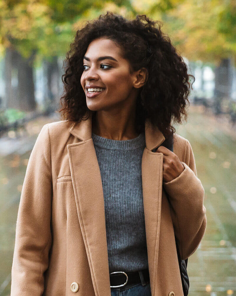 Woman in a long brown coat