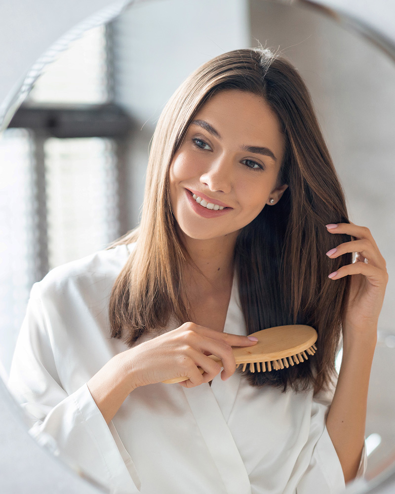 Woman brushing her hair
